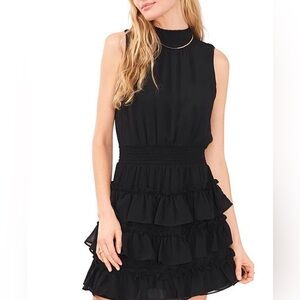 1. STATE
Smocked Mock Neck Blqck Sleeveless Ruffle Tiered Dress